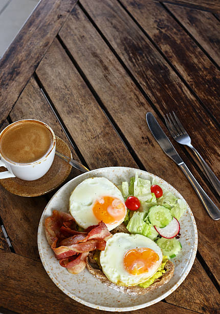 istock traditional breakfast with fried egg and salad 2254016218