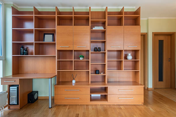 istock Modern Wooden Shelving Unit in a Bright Home Office Interior 2254017663