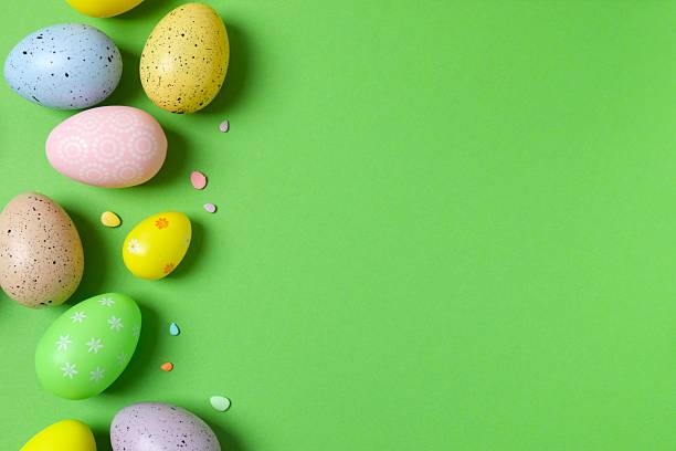 istock Happy Easter. Colorful eggs on color background, space for text or advertising 2254018612