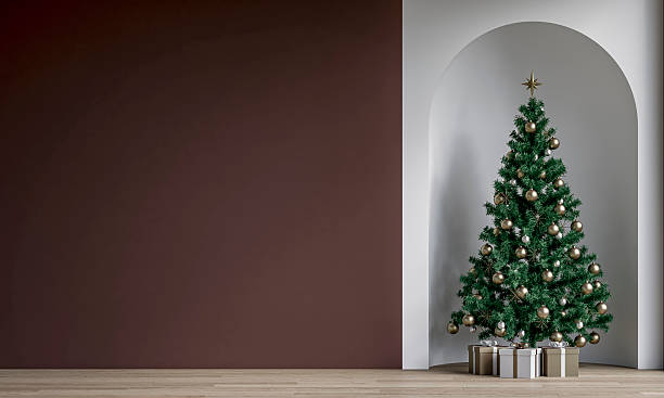 istock Modern minimalist unfurnished interior decorated for Christmas, with a  wall, a Christmas tree with presents in a wall niche, near a window 2254018899