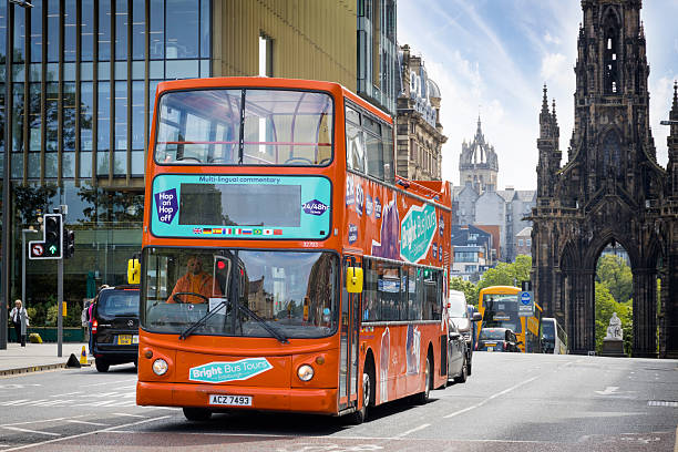 Holidays in Scotland - Sightseeing Bus in Princes street in Edinburgh. The street is one of the main arteries of the Old Town in Edinburgh