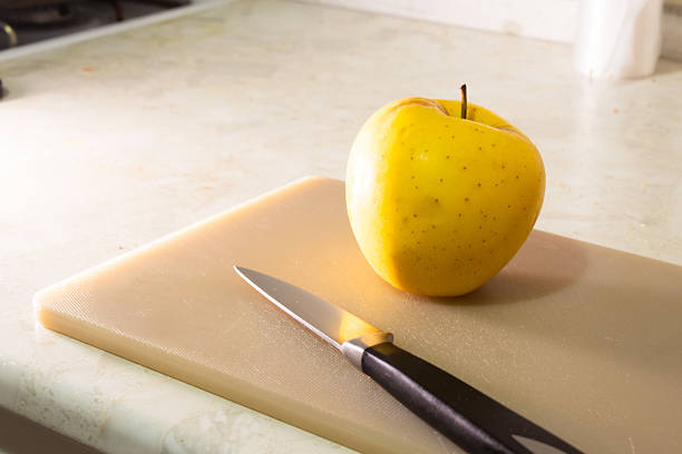 Fresh Yellow Apples Arranged on a Decorative Plate