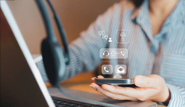 istock Online customer service and AI virtual assistant concept.Support agent use smartphone,laptop with digital interface icon for customer support, chatbot technology, remote work, and modern business communication service. 2254024799
