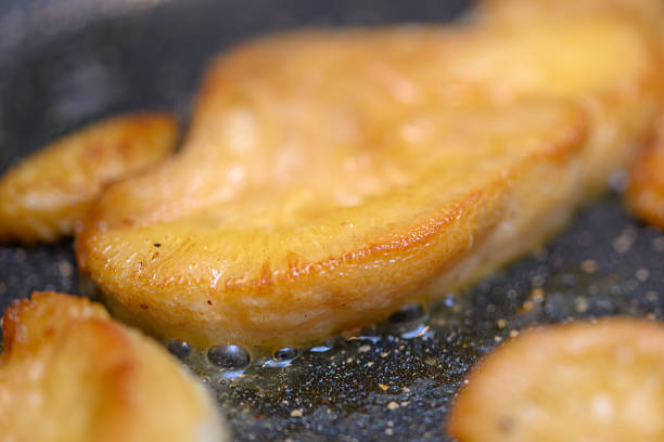 Searing Lion's Mane Mushroom in butter in a pan