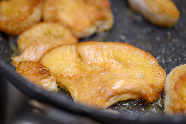 Searing Lion's Mane Mushroom in butter in a pan