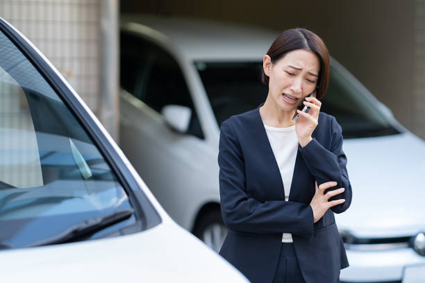 istock A middle-aged businesswoman working in a car 2254030978