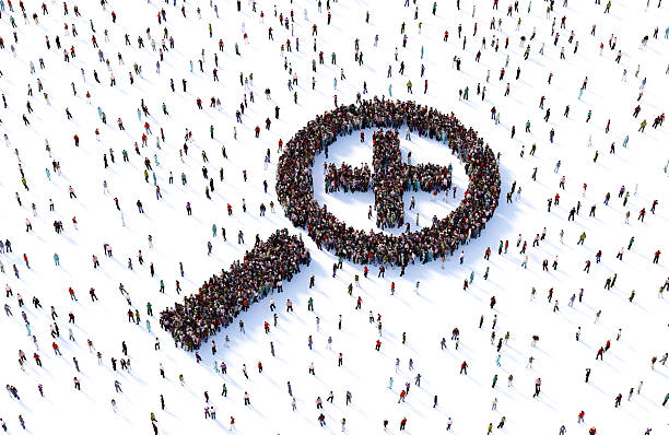 istock Human Crowd Forming Magnifier Symbol On White Background 2254033102