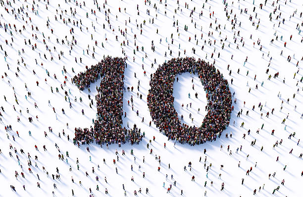 Human crowd forming number 10 on white background.