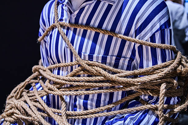 Close-Up Of Person Hiding Under The Sheets