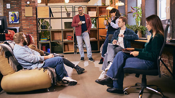 istock Creative team brainstorming in modern coworking office interior 2254039852