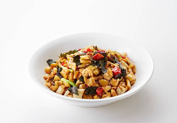 istock Delicious Chinese food, fried pickled cucumber with basil 2254041837