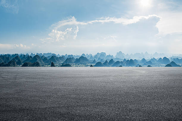 istock Empty asphalt road and beautiful karst mountain landscape. 2254044292