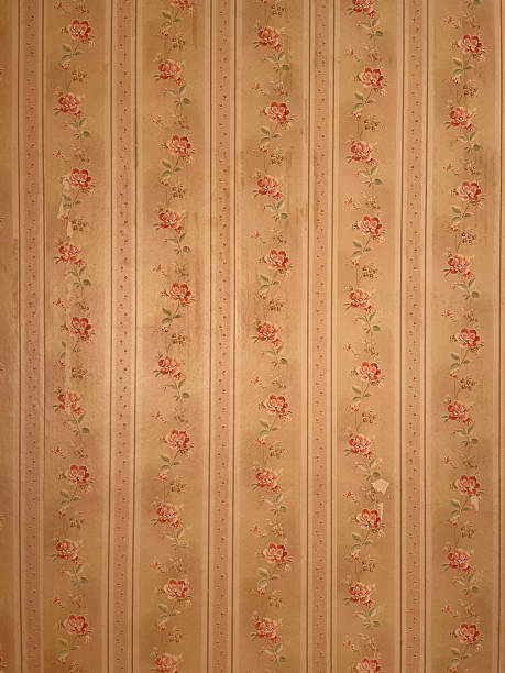 istock Old wallpaper on the wall. Old wallpaper for texture or background. 2254046229