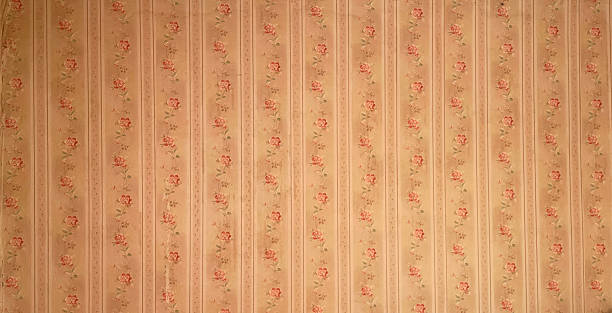 istock Old wallpaper on the wall. Old wallpaper for texture or background. 2254046238
