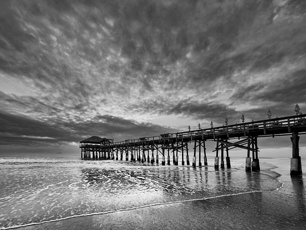 istock Black and White Sunrise at Cocoa Beach Pier, Florida 2254058096