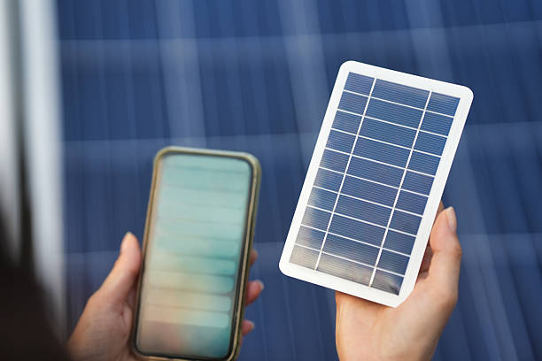 istock Portable Solar Panel Charging Smartphone Outdoors 2254058303