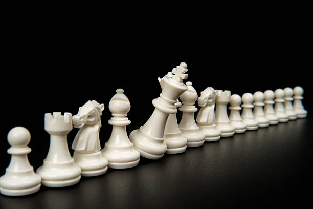 istock Falling chess king causing a chain reaction among pieces representing strategic failure, leadership collapse, domino effect, and consequences of poor decisions in business and management. 2254058378