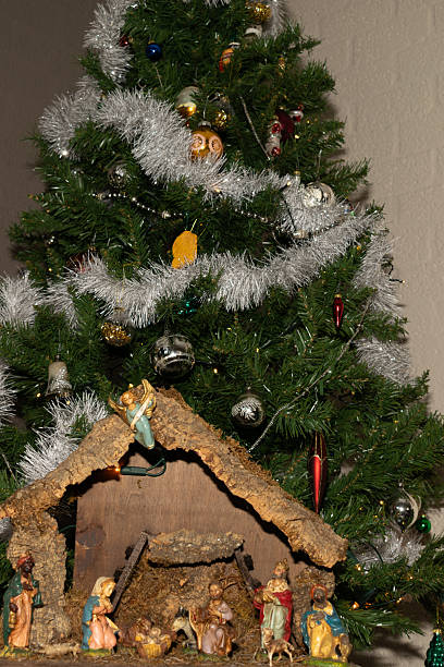 istock a nativity scene placed under the Christmas tree 2254059077
