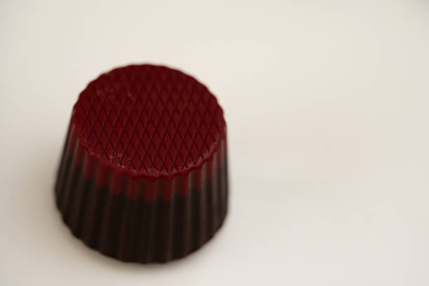 Gourmet Dark Chocolate Praline with Red Patterned Top