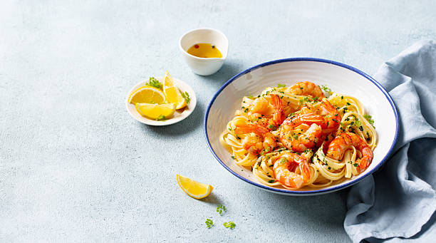 istock Pasta with shrimps. Grey background. Close up. Copy space. 2254067712