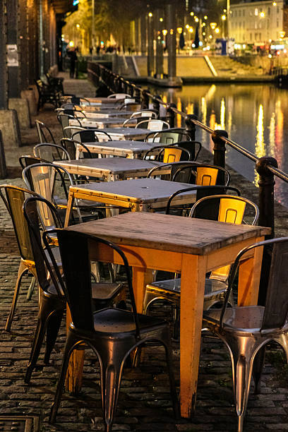 istock Bristol UK 12-29-2025 Empty outdoor cafe tables and chairs at night. 2254068512