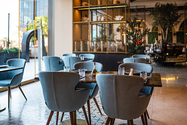istock Sophisticated Dining Area with Modern Blue Chairs and Elegant Layout 2254072975