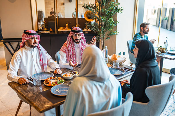 istock Enjoyable Dining Experience for Arab Couples in Exclusive Restaurant 2254073027