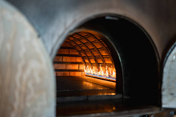 istock Traditional Stone Oven with Flames in Middle Eastern Restaurant 2254073105