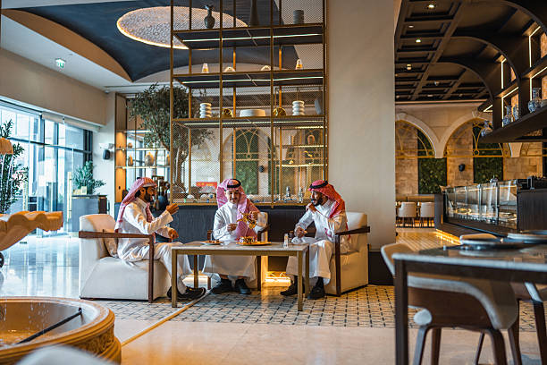istock Lively Discussion Among Middle Eastern Men in Modern Lounge 2254073161