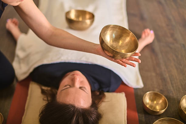 istock Relaxing sound therapy with singing bowls 2254080777
