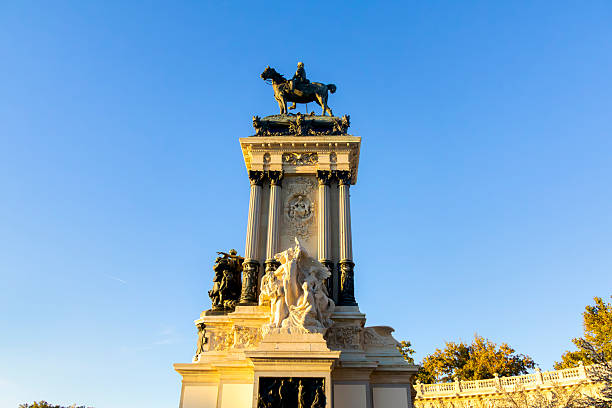 The Monument to the Spanish Nation personified by King Alfonso XII, better known as the Monument to Alfonso XII, is an architectural and sculptural ensemble from the early 20th century dedicated to the aforementioned monarch, located in Madrid's Retiro Park.