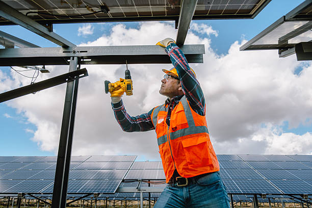 istock Experienced Construction Worker: Elderly Man Building Metal Fence with Drill 2254084768