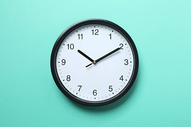 istock Big beautiful stylish clock on color background 2254091678