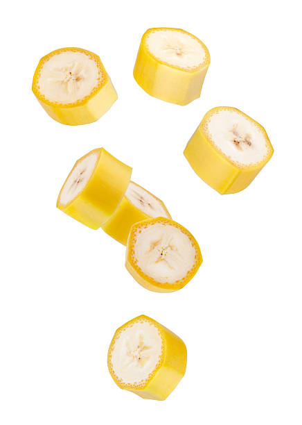 istock Banana pieces with peels forming figure looks like a loop in space. Isolated on white 2254094143