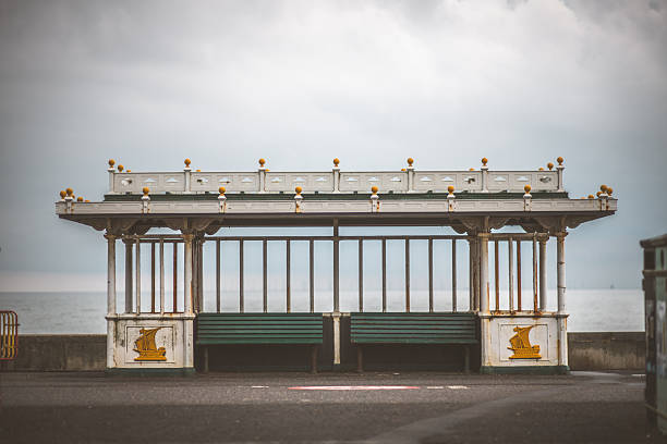 This ornate shelter provides a place to rest and enjoy the coastal views, with the sea in the background