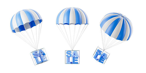 istock Three blue and white parachutes dropping 