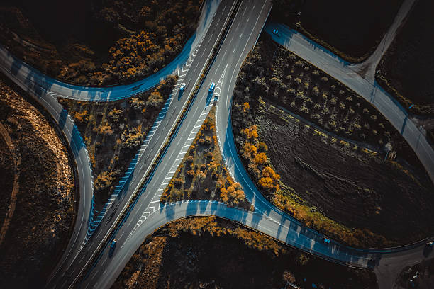 Busy urban road junction. Overhead view