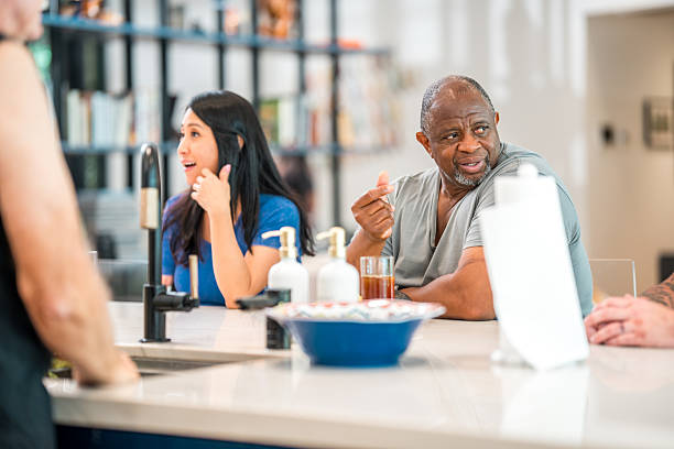 istock Diverse Professionals Discussing at Rehab Center Kitchen 2254106626
