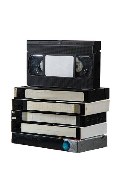 istock Stack of old vintage VHS cassette tapes isolated on white background. Nostalgic retro media. 2254107188