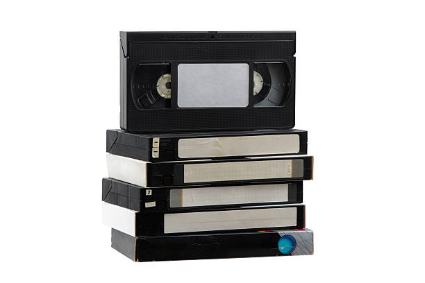 istock Stack of old vintage VHS cassette tapes isolated on white background. Nostalgic retro media. 2254107189