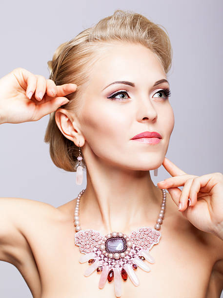 Young blonde woman with necklace