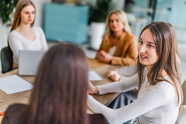 istock Businesswomen discussing ideas in modern office environment during work meeting with focus on collaboration and teamwork 2254116759