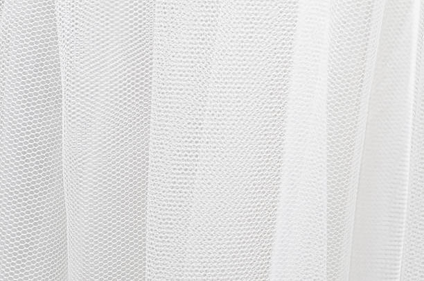 Soft Ethereal White Mesh Texture with Graceful Folds for Translucent Decorative Drapery