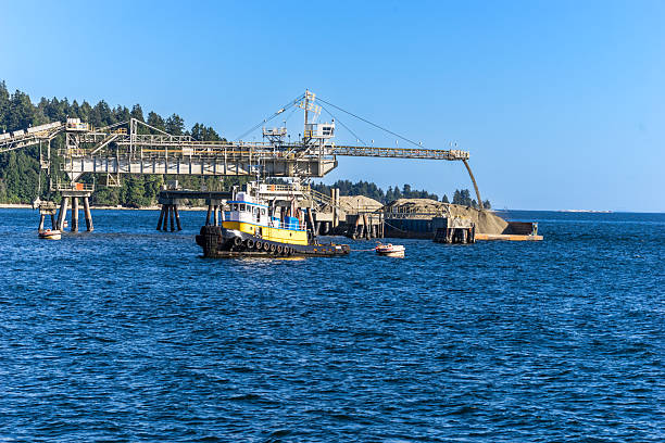 Sechelt,Canada, August 18, 2012:View  to marine ore loading  operation at Sethelt, British Columbia, Canada