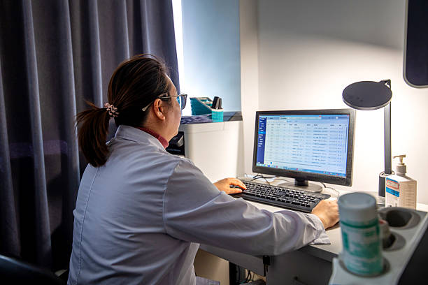 istock An Asian female doctor working in front of a computer. 2254118820