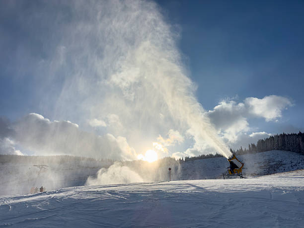 istock Snow Cannon Making Artificial Snow at Sunset on a Ski Slope 2254123710