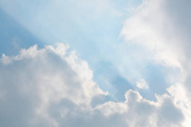 Dramatic fluffy clouds in the blue sky background.Cloudy white blue sky in the nice blue heaven sky.