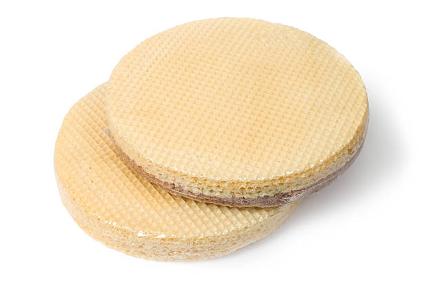 Waffle cakes for a homemade cake on a white background. Vacuum-packed wafer cakes