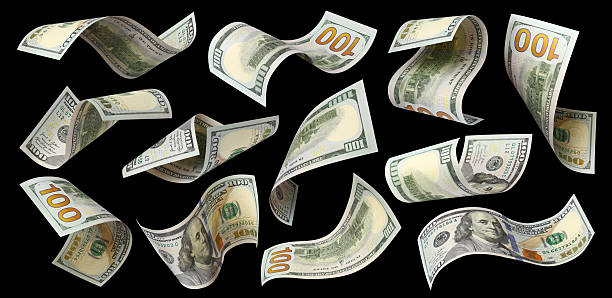 istock Set of flying hundred dollar banknotes, isolated on black background 2254125510