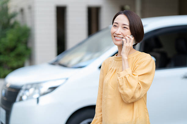 istock Middle-aged woman driving a car 2254127218